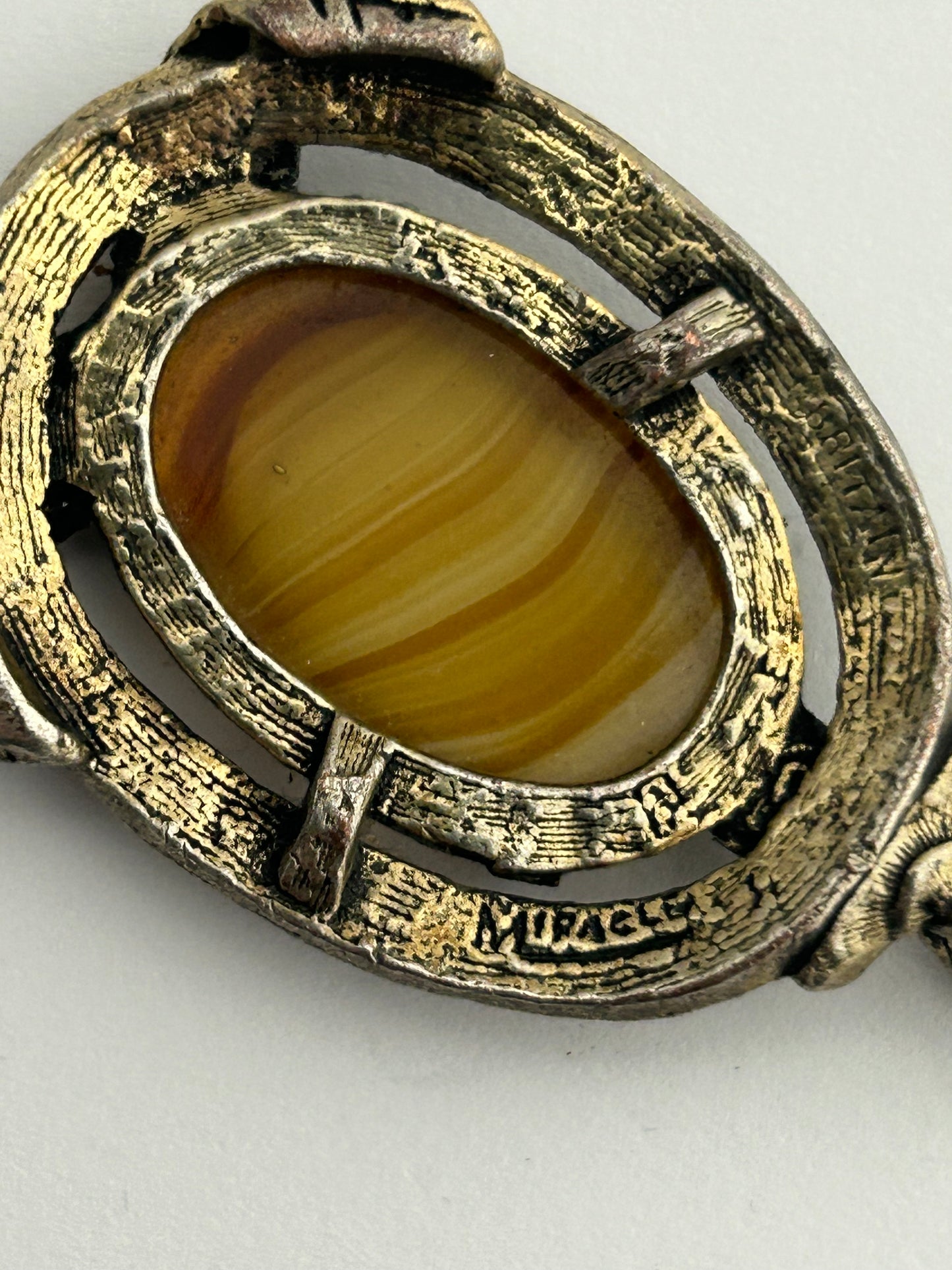 Vintage Silver Tone Base Metal MIRACLE Signed Banded Glass Stone Set Pendant