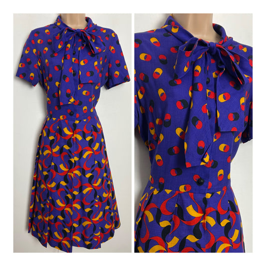 Vintage 1970s MONTIGO BAY Size 12 Blue Red & Mustard Yellow Abstract Print Pussy Bow Pleated Day Dress