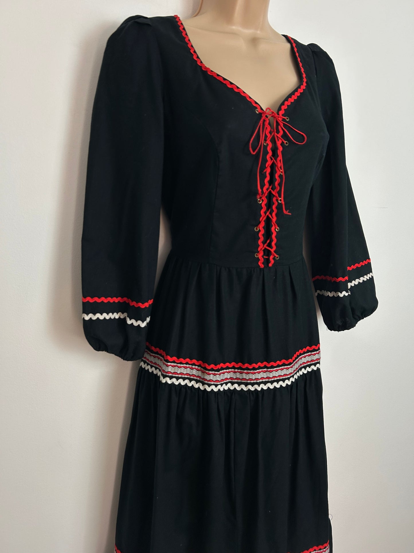 Vintage 1970s Size 10 Black Cotton Red Ric Rac Trim Lace Up Bodice Long Sleeve Boho Maxi Dress