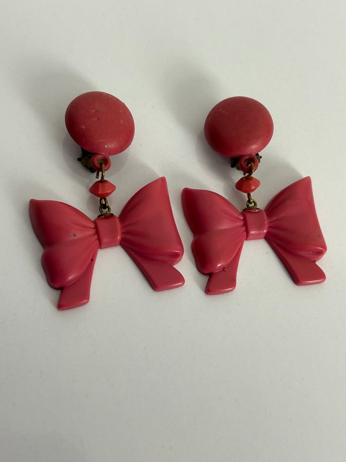 Vintage 1950s Cute Pink Plastic Dangle Bow Clip On Earrings