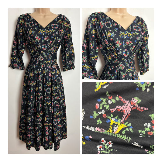 Vintage 1950s UK Size 12 Black Red Green Yellow Pixelated Folk Print Cotton Pleated Day Dress