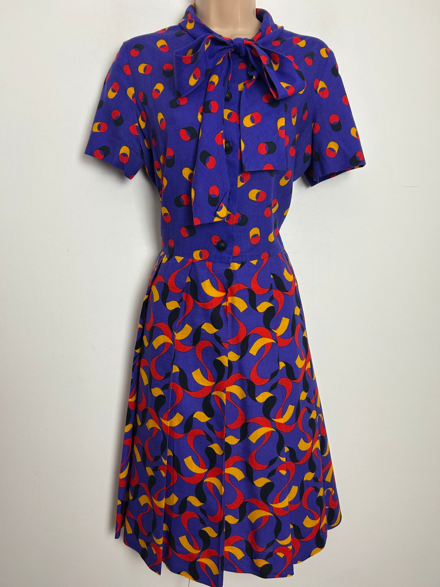 Vintage 1970s MONTIGO BAY Size 12 Blue Red & Mustard Yellow Abstract Print Pussy Bow Pleated Day Dress