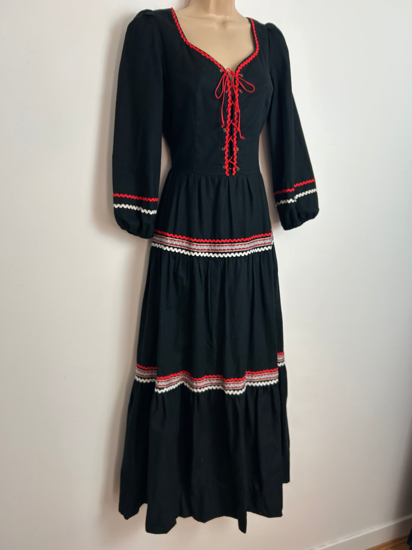 Vintage 1970s Size 10 Black Cotton Red Ric Rac Trim Lace Up Bodice Long Sleeve Boho Maxi Dress