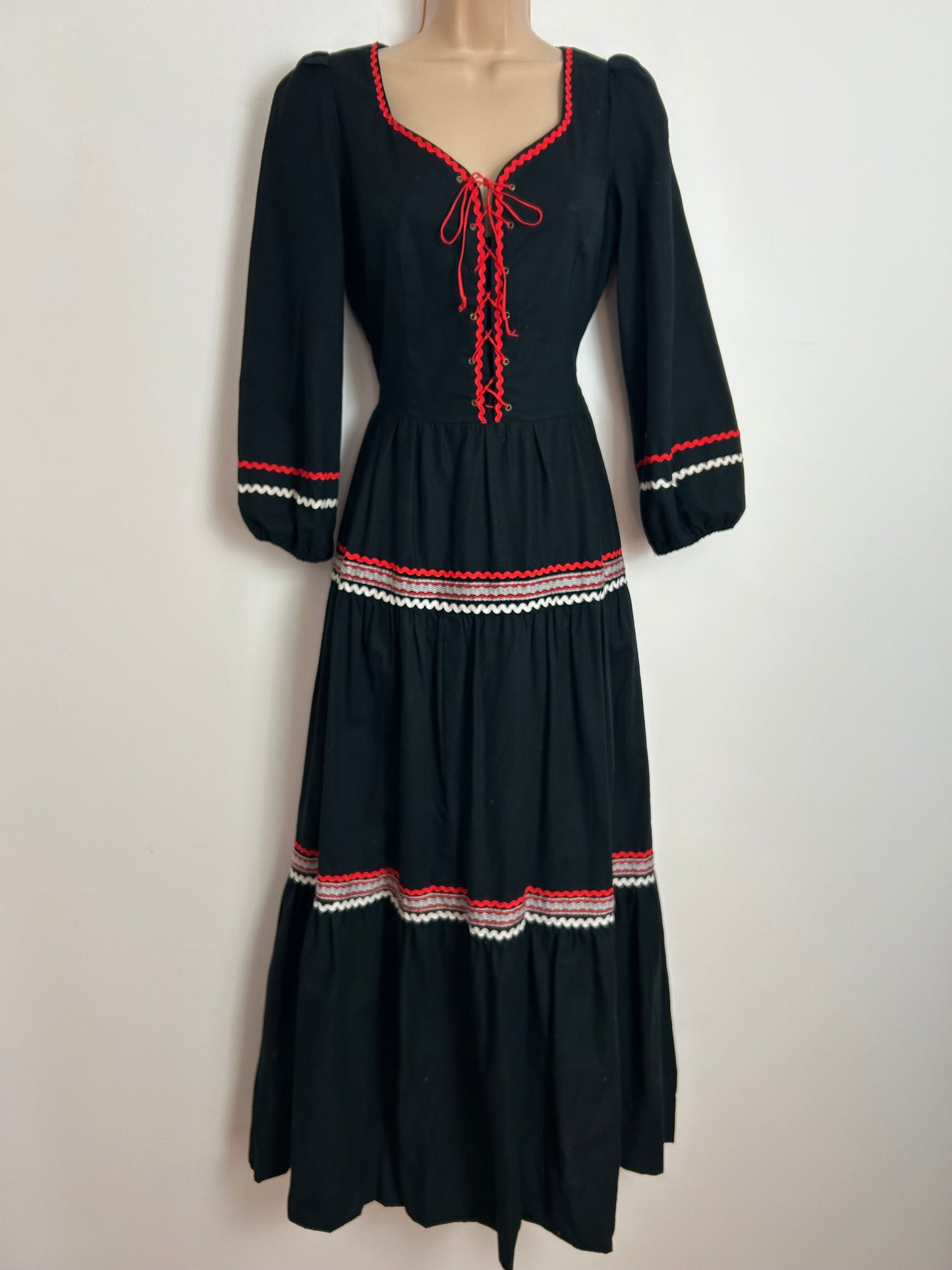 Vintage 1970s Size 10 Black Cotton Red Ric Rac Trim Lace Up Bodice Long Sleeve Boho Maxi Dress