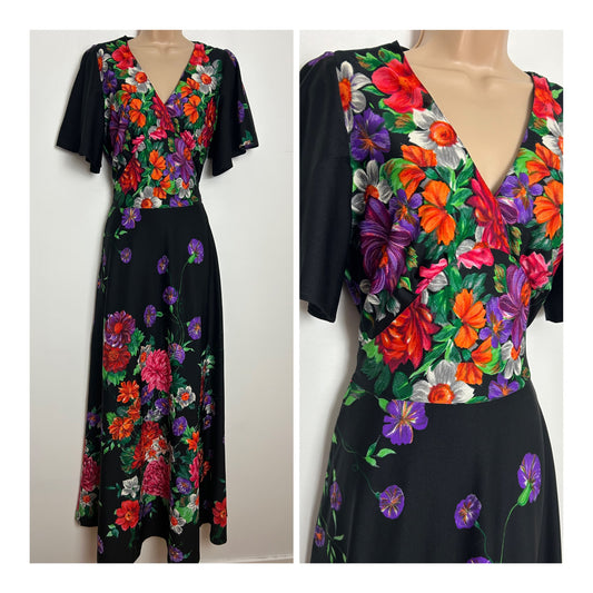 Vintage 1970s Size 10 Black Orange Red & Purple Floral Print Short Sleeve Tie Back Maxi Dress