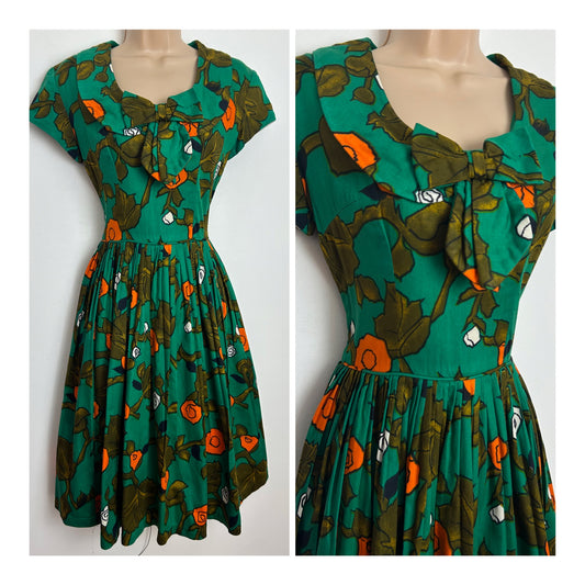 Vintage 1950s CARNEGIE "ITS A SYMPHONY" Size 6 Green Brown & Orange Floral Print Short Sleeve Pleated Cotton Day Dress