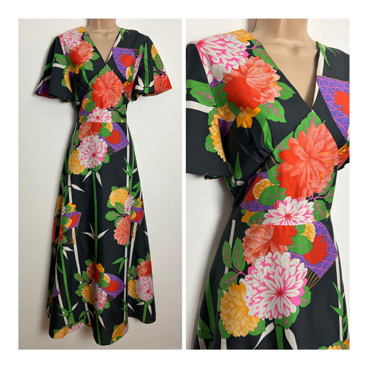 Vintage 1970s MONTIGO BAY Size 10 Black Orange & Green Floral Bamboo & Fan Print Short Sleeve Boho Maxi Dress
